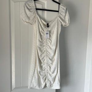 White eyelet mini dress